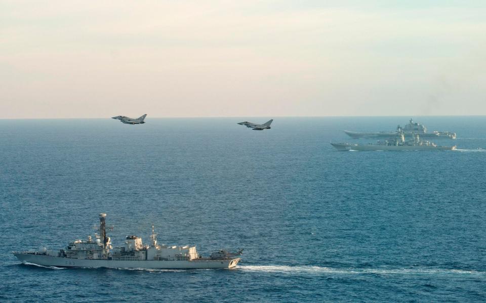 he Russian Warships Petr Velikiy (centre) and the Admiral Kuznetsov (background) as they transit near to our sovereign waters on their way back to Russia