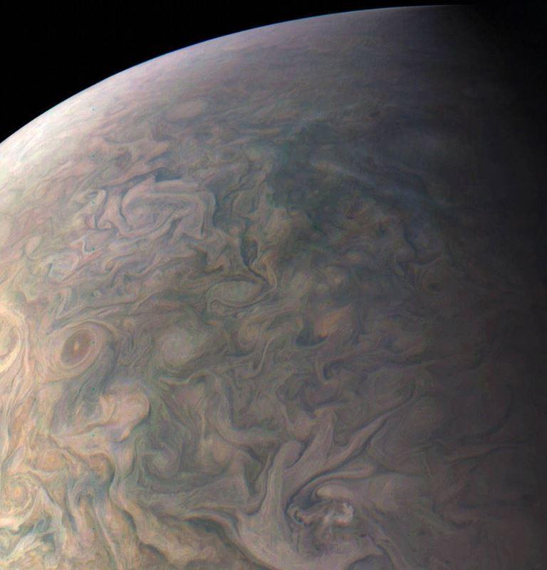  Juno took the picture from an altitude of 10,300 miles (16,600 kilometres) above Jupiter's clouds