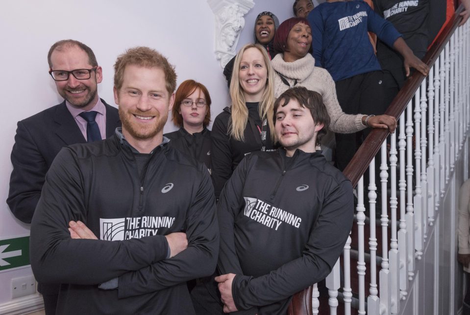  A picture of his mother with a group of young people on a flight of stairs was recreated with the Prince and the current crop of volunteers