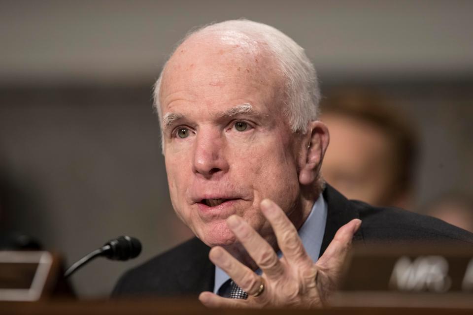  John McCain put his name to a statement calling the order 'hasty' and 'harmful'