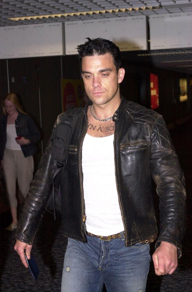  He's No Angel . . . Robbie Williams left Take That and stormed the charts - before partying took over