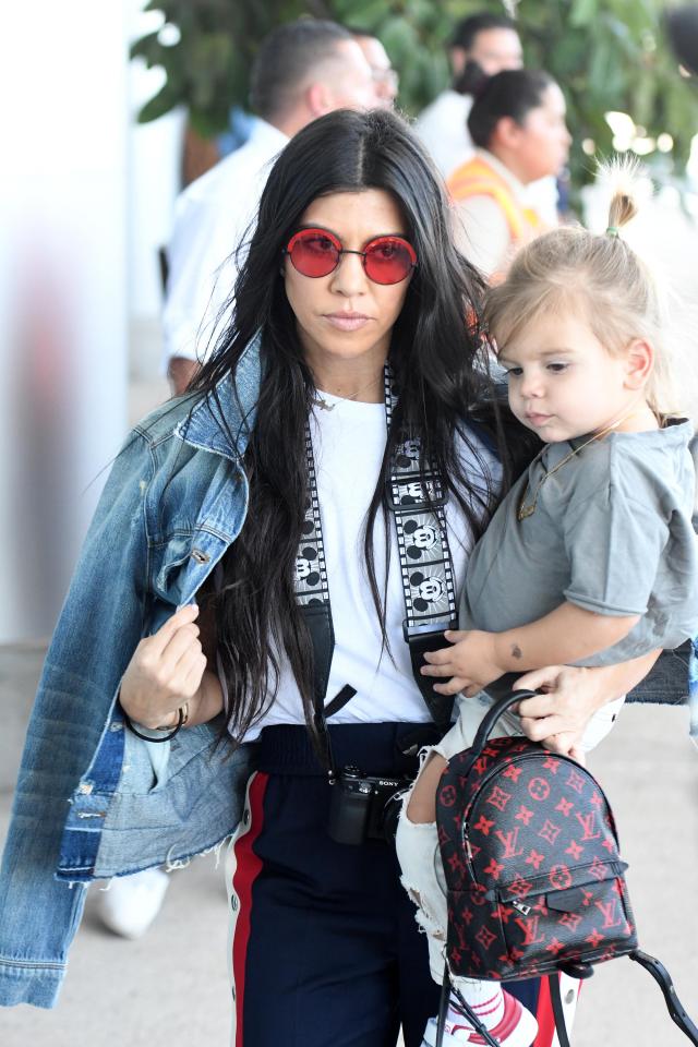  Kim's sister Kourtney carried her son Reign