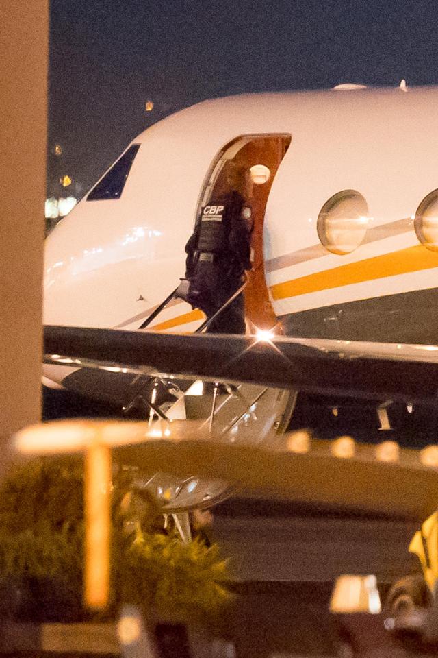  A Customs and Border Protection Officer goes aboard Kim Kardashian's private plane