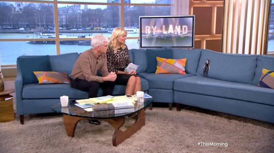  The hosts poked fun at Rylan's drama by placing a doll on the sofa in his place