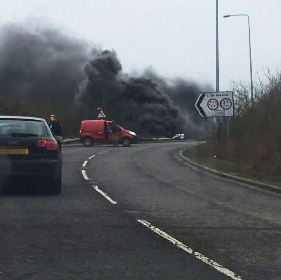  Thick plumes of black smoke could be seen across the A12 after the lorry plunged onto the dual carriageway