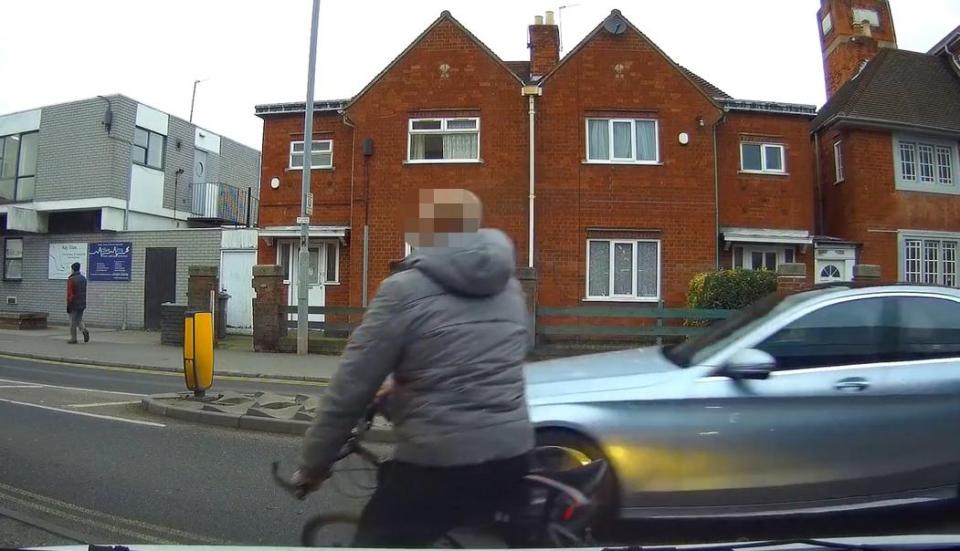  A Youtbe video shows a man going past on his bike before stopping and getting off his bike claiming that he has been 'hit'