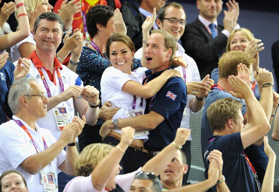  The delighted couple hugged among the cheering crowd during the 2012 Olympic Games