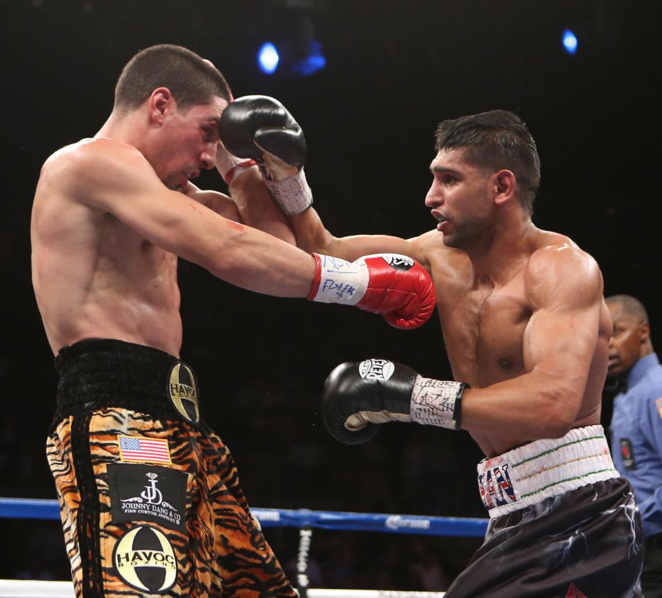  Amir Khan was in control of the fight against Danny Garcia before he was knocked out