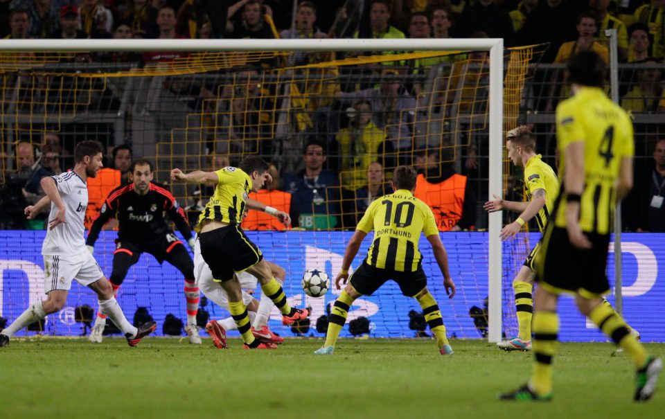 Robert Lewandowski swivels on the ball before firing high into roof of the net