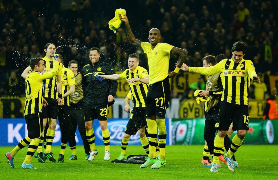 Borussia Dortmund celebrate after coming from behind to beat Malaga