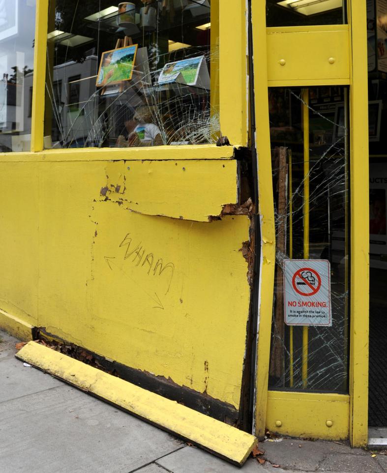 The damage caused to the Snappy Snaps store in Hampstead, north London, after George Michael crashed into it in his Range Rover 