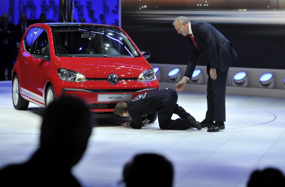  Volkswagen board member Juergen Stackmann (right) looks on as the comedian (left) disrupts the Volkswagen press conference in Switzerland in 2016