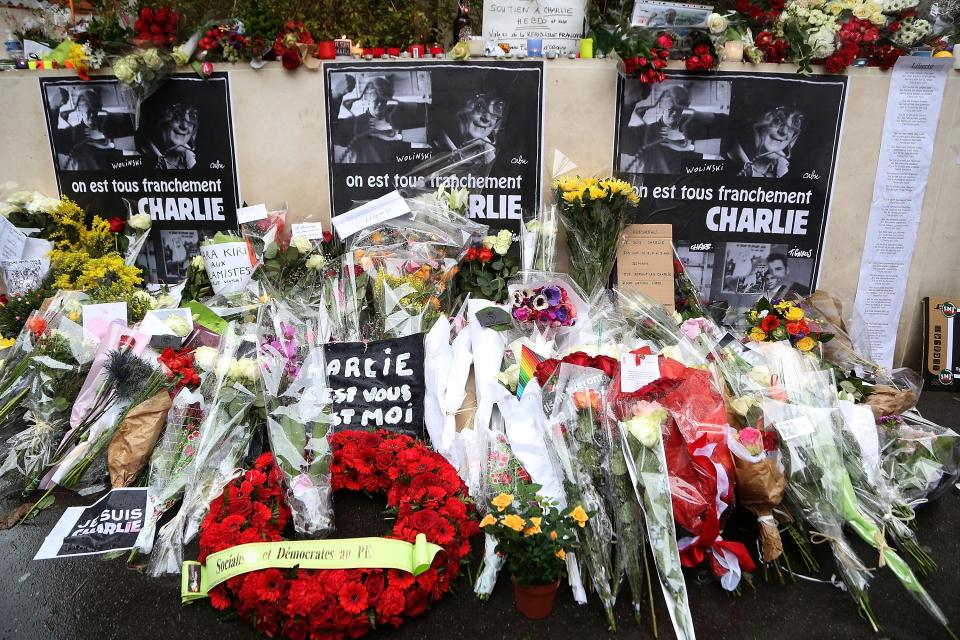  Flowers laid close to the Charlie Hebdo offices on a day of mourning following the attack