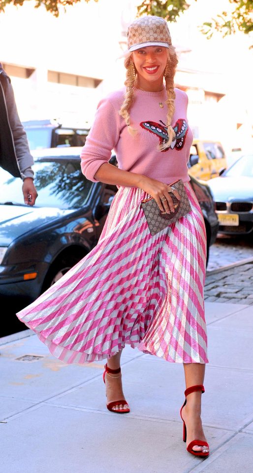  Beyonce steps out in a butterfly motif jumper - a key symbol of the secret society