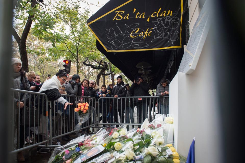  People pay their respects at the Bataclan one year after the Paris attacks in which 130 people were killed