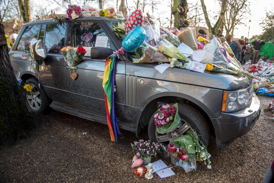  Tributes were left on George's Range Rover outside his Highgate home after his death