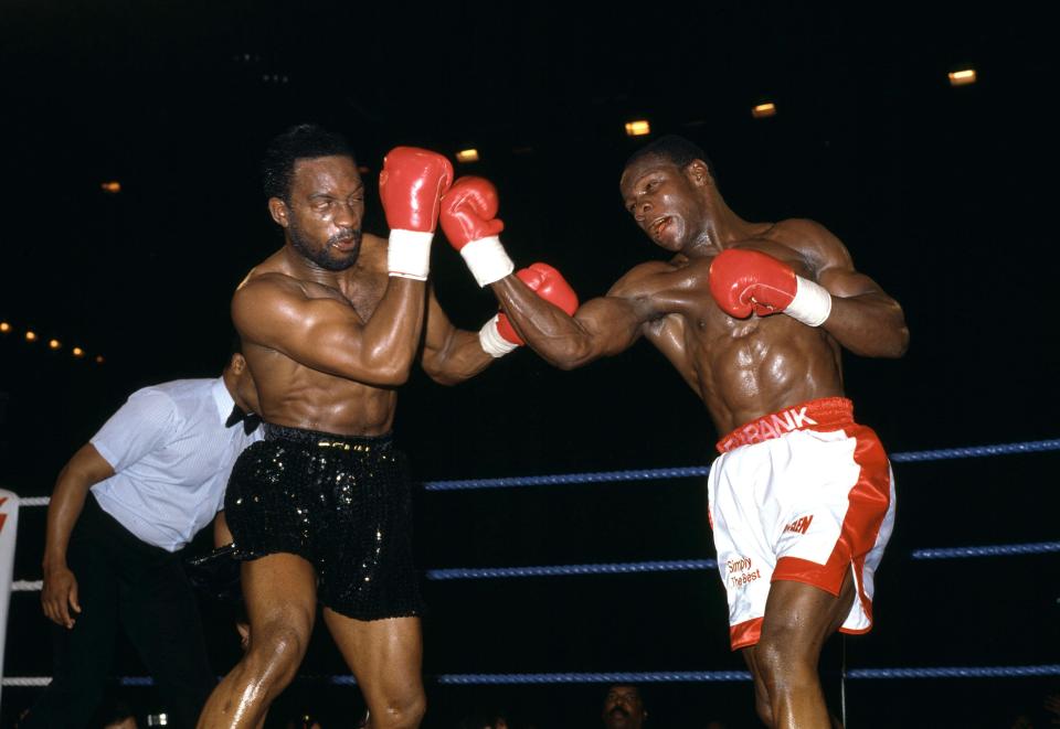 Nigel Benn and Chris Eubank trade blows in their first fight in 1990