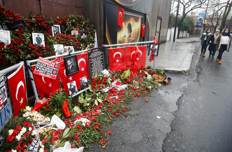  Tributes laid outside the Istanbul nightclub in Istanbul where 35 people were killed