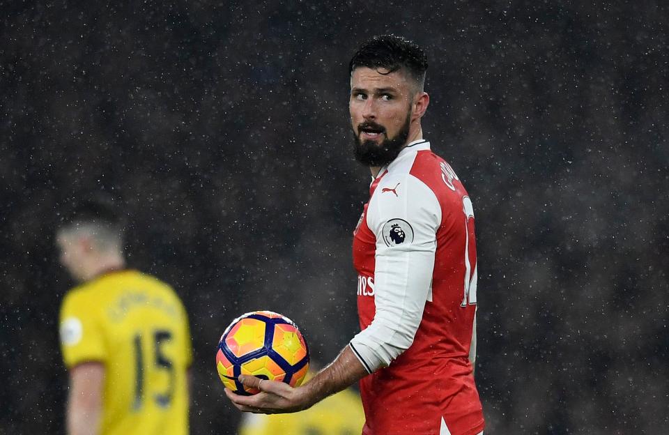  Olivier Giroud appeared to gesture to the bench that he was injured after just two minutes