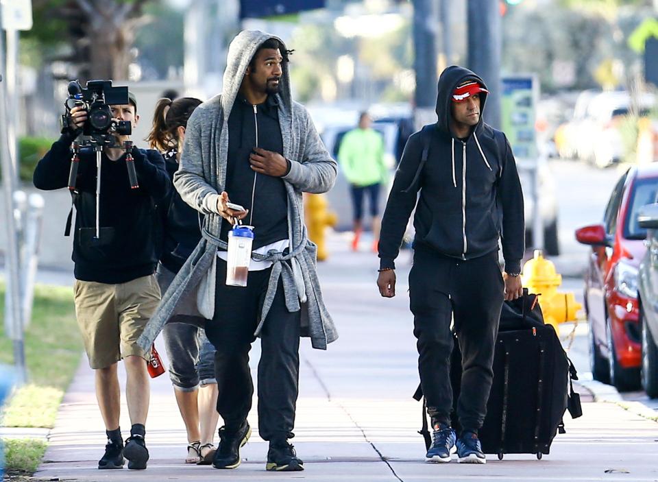  Haye made sure he didn't over-exert himself too much on his walk-out, as members of his team carried his luggage