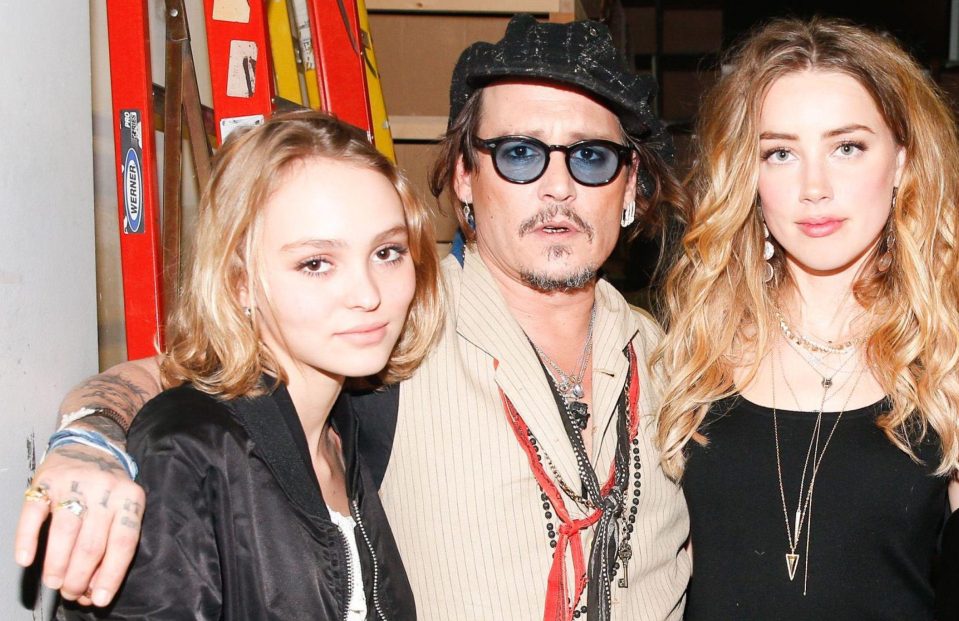 Lily-Rose Depp with her father Johnny Depp, and Amber Heard