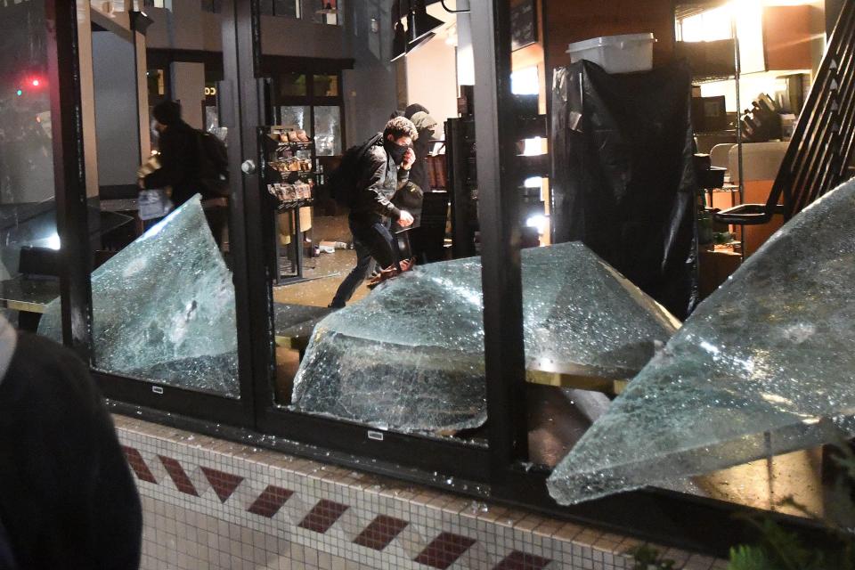  Rioters looted and vandalised a Starbucks store