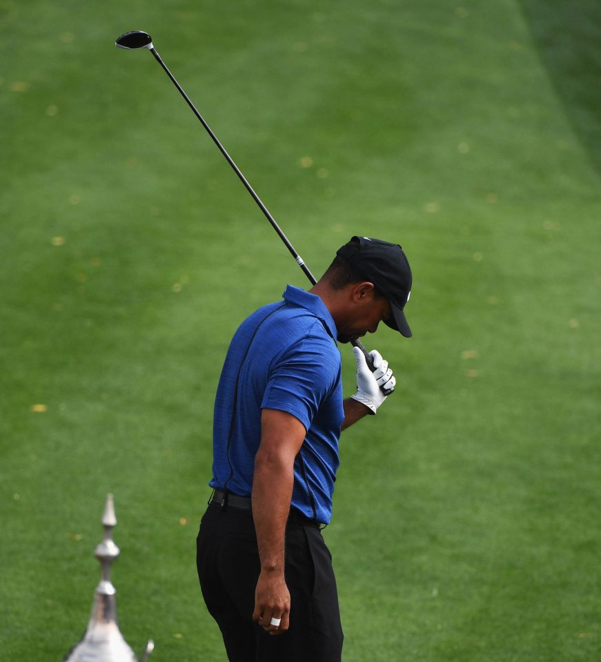  Tiger Woods shows his frustration at a wayward tee shot in Dubai