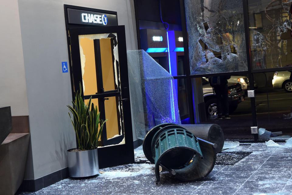  Debris and broken glass outside a Chase Bank