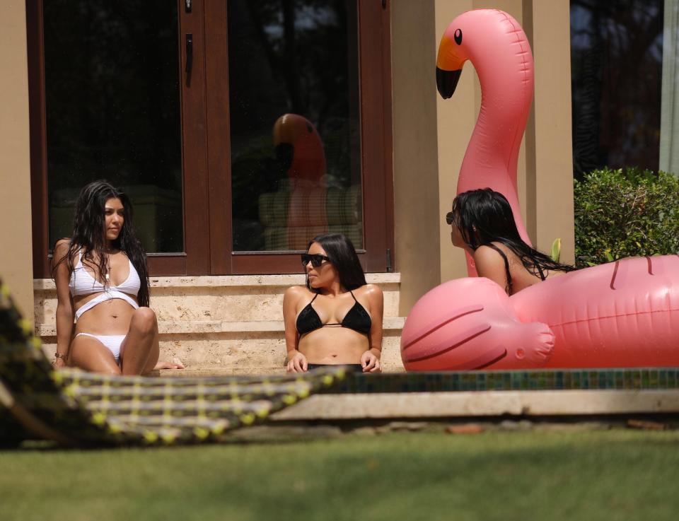  Kim was soaking up the sun with her sister Kourtney