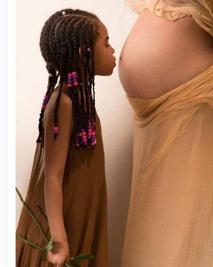  In another snap, five-year-old Blue and her future siblings took centre stage as Blue planted a kiss on her mother's stomach