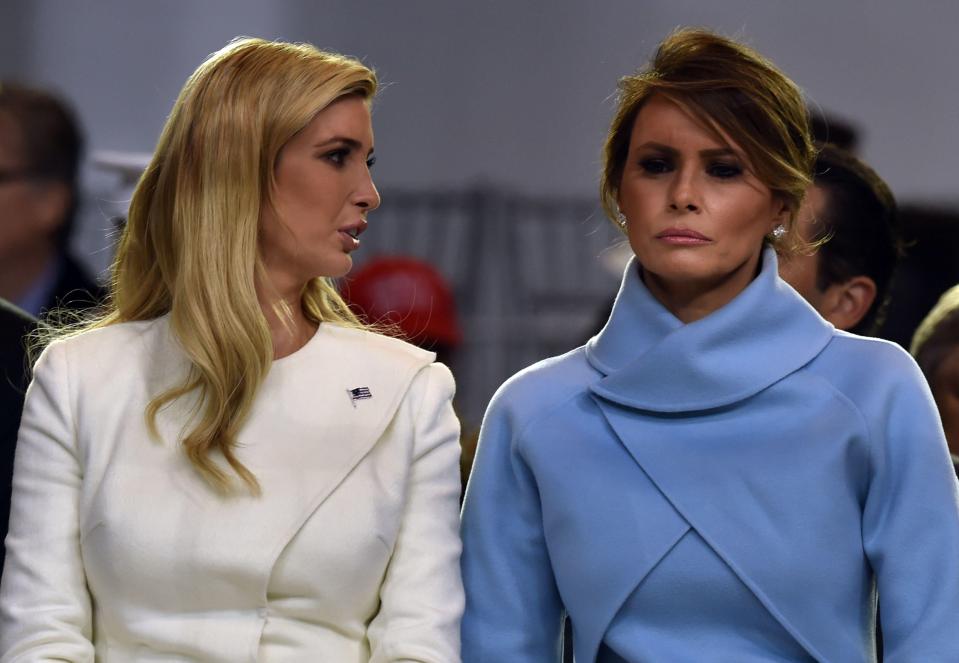  US First Lady Melania Trump speaking with Ivanka during the presidential inaugural parade