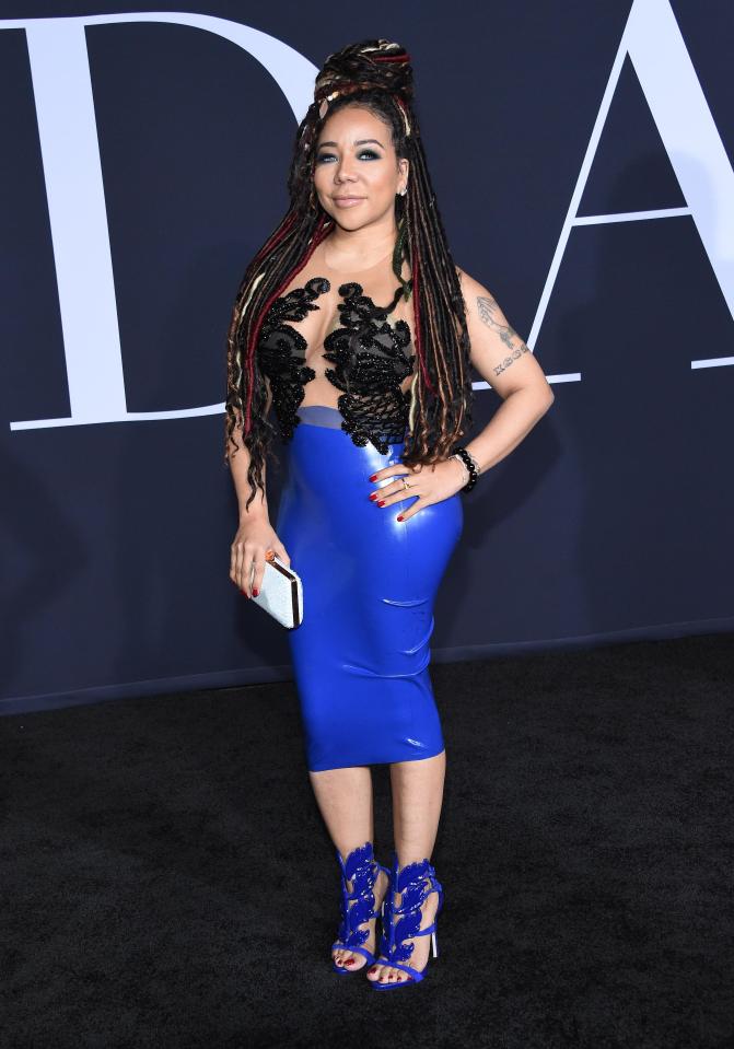  Singer Tameka "Tiny" Harris poses at the Fifty Shades premiere