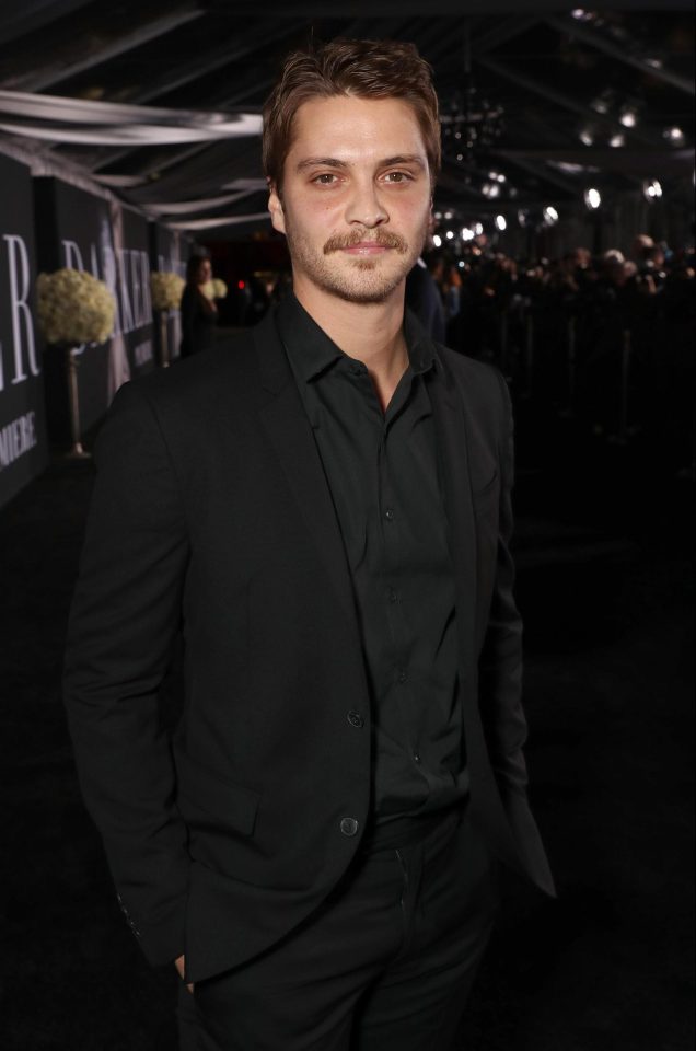  Luke Grimes looks very smart in his dark suit