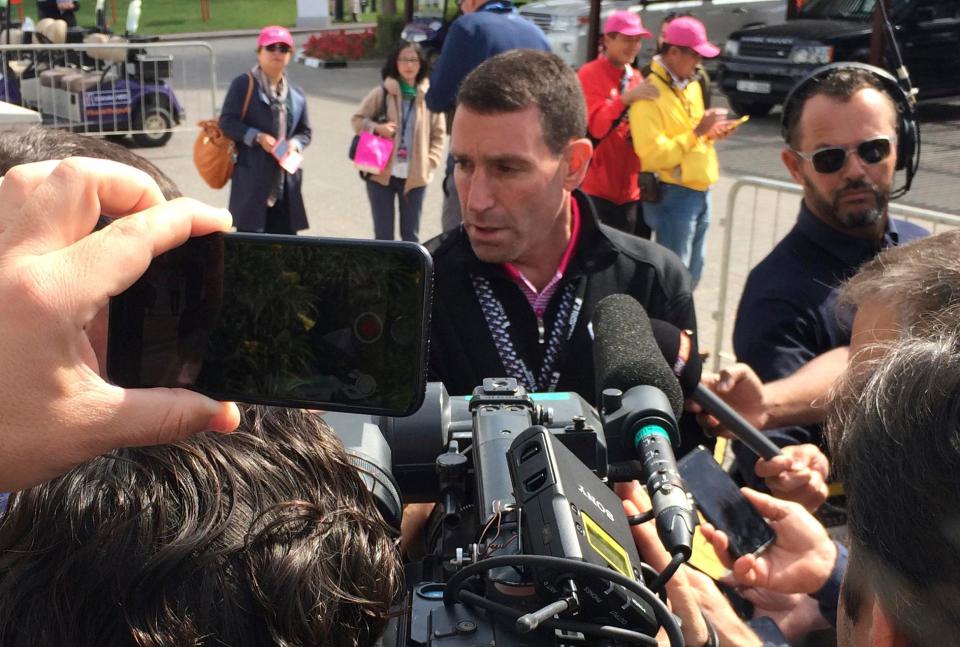  Tiger Woods' agent Mark Steinberg talks to reporters today in Dubai