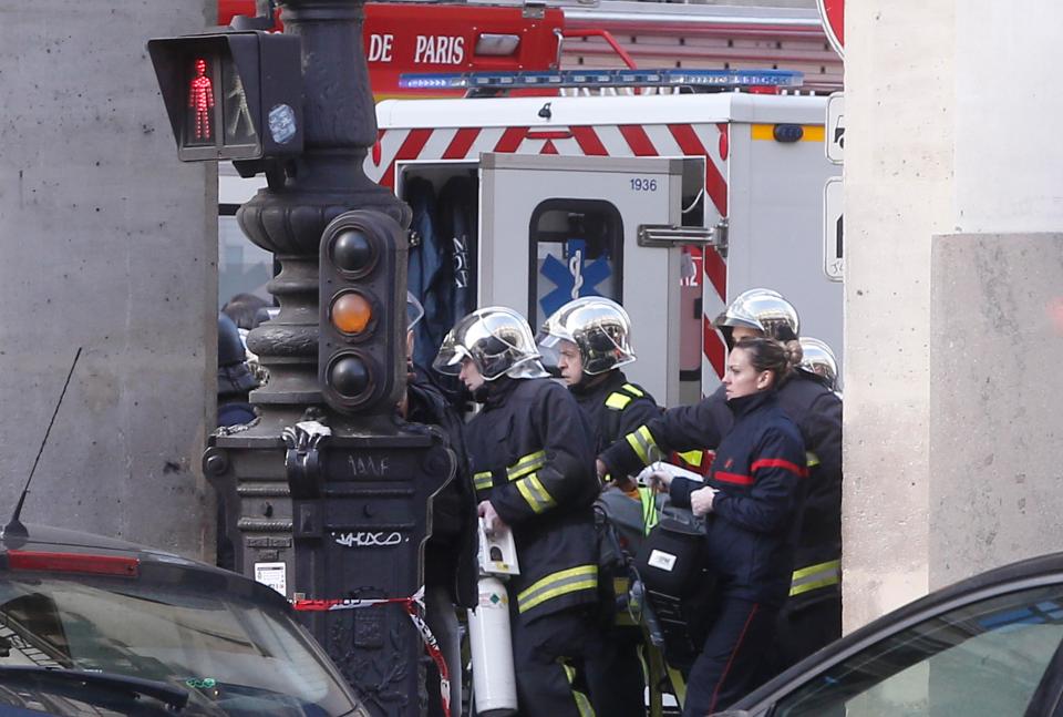  Rescue workers were seen carrying out a stretcher