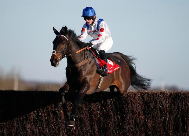 Sean Bowen riding Clan Des Obeaux to win The Fuller's London Pride Novices' Steeple Chase at Newbury Racecourse