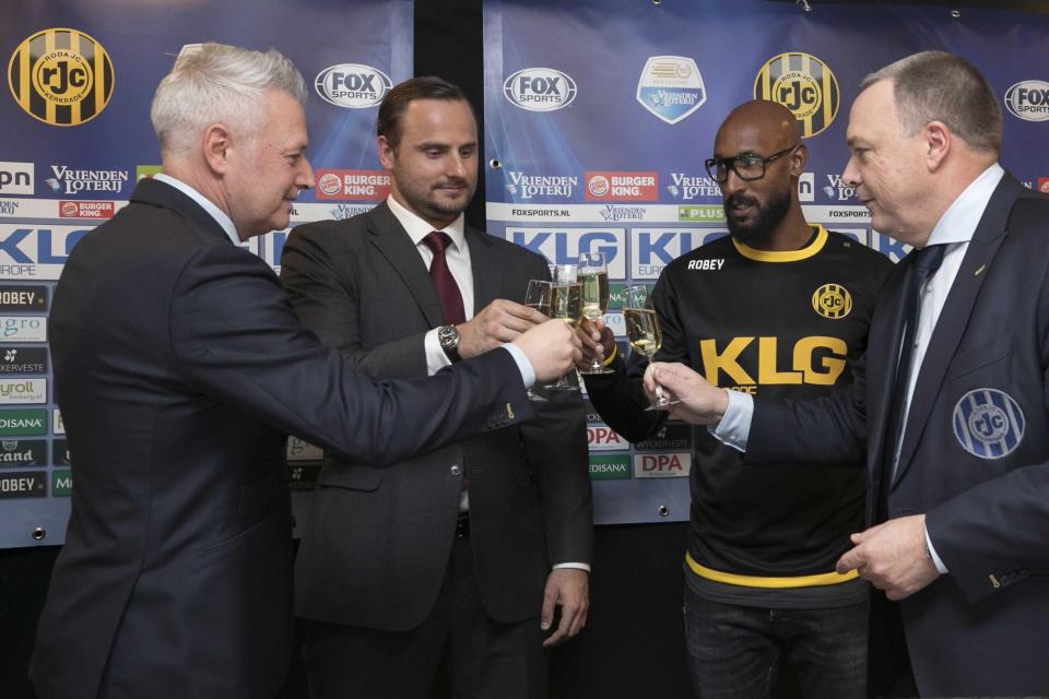 Anelka and Aleksei Korotaev toast their investment at Roda JC