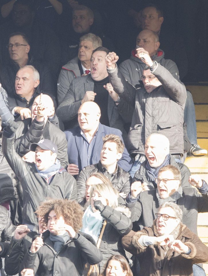  Chelsea fans celebrate Eden Hazard's second goal around Wenger