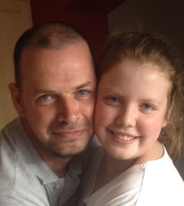 Emma Sim with her dad Graeme before she tragically died in her parents' arms at home in November 2015