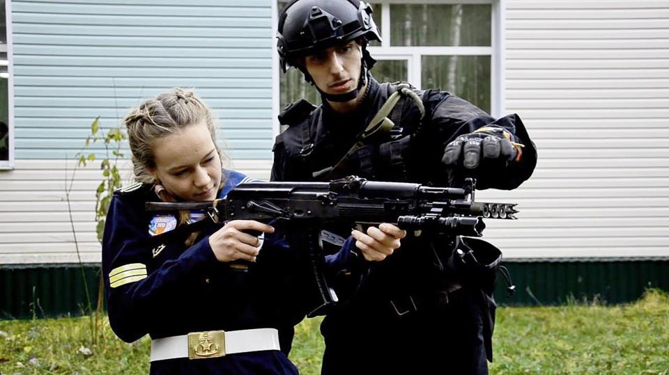  Girls and boys in Putin's youth army are taught how to handle weapons and other military skills