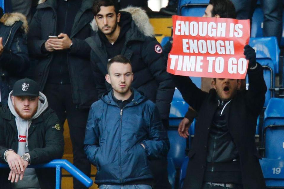 Kane Hobbs with his banner at Stamford Bridge on Saturday