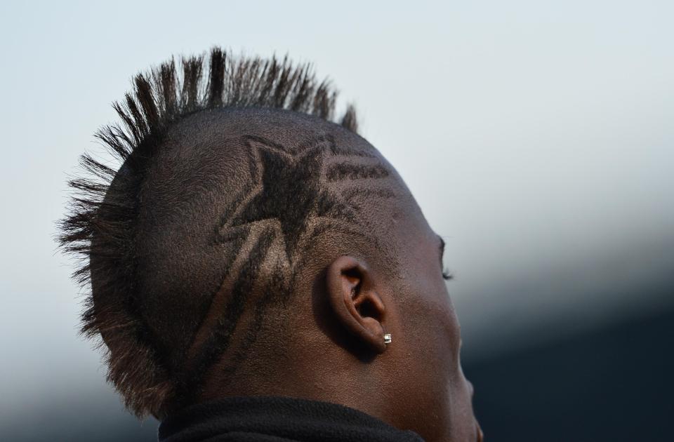 M'Baye Niang is often seen sporting interesting hair cuts, like this one at Milan