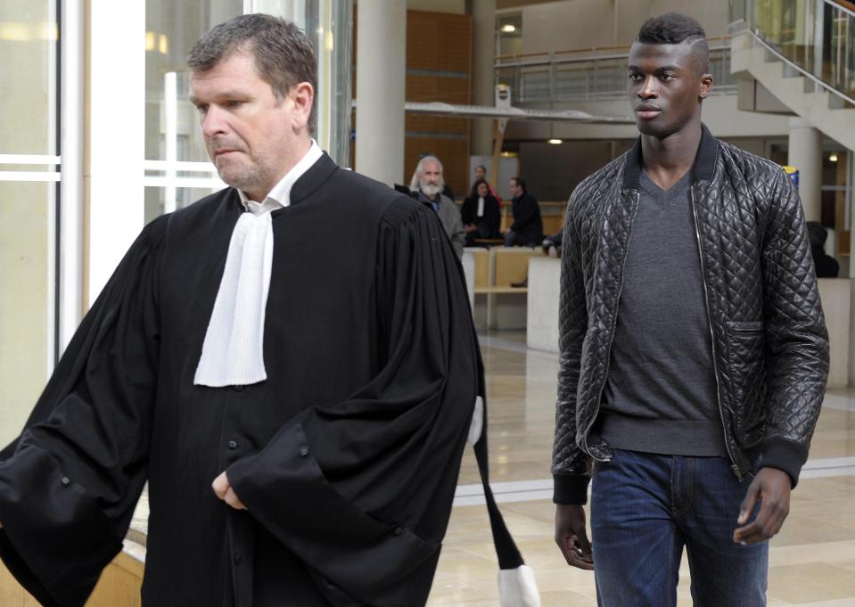 M'Baye Niang follows prosecutor into court ahead of case for car crash