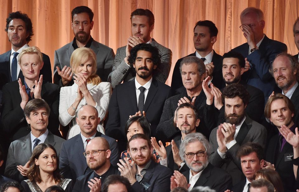  Nicole Kidman sat beside her Lion co-star Dev Patel for the stunning photo