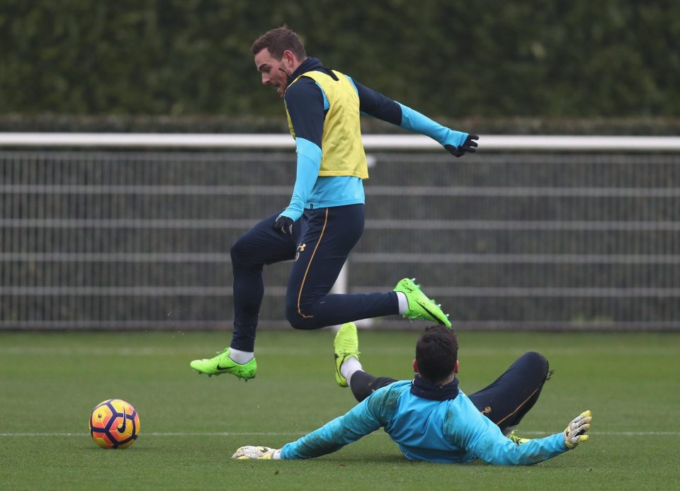 Vincent Janssen rides a tackle during the Spurs training session - he will be desperate to start hitting the net on a regular basis