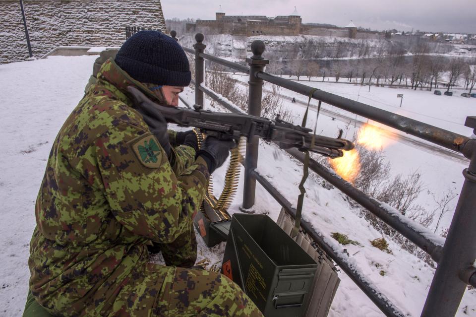  A member of the Estonian Defence League fires a machine gun during live ammo exercises