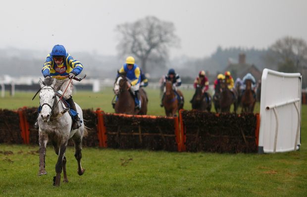 Wayne Hutchinson riding Master Blueyes clear the last to win The Weatherbys Hamilton Juvenile Hurdle Race at Ludlow racecourse