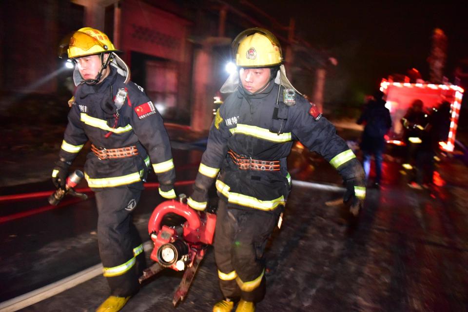  Firefighters are today searching through the wreckage of the factory