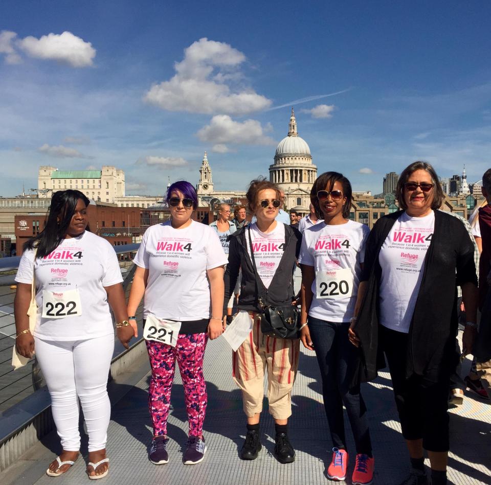  Kaylin (second from left) at a Refuge charity walk through London led by domestic abuse survivors and Helena Bonham-Carter (centre)