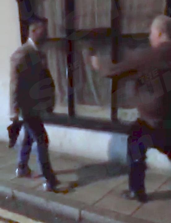  Shameful footage obtained by The Sun shows Wales rugby star Gareth Davies chasing a bouncer with a shoe - before later decking him and another bouncer